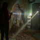 Tess and Joel encounter a petrified zombie.